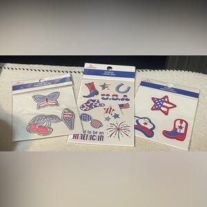 Set of 3 Patriotic Themed Accessories. 1 sticker sheet and 2 packs of 3 patches.